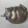 Satiated (bronze pig)